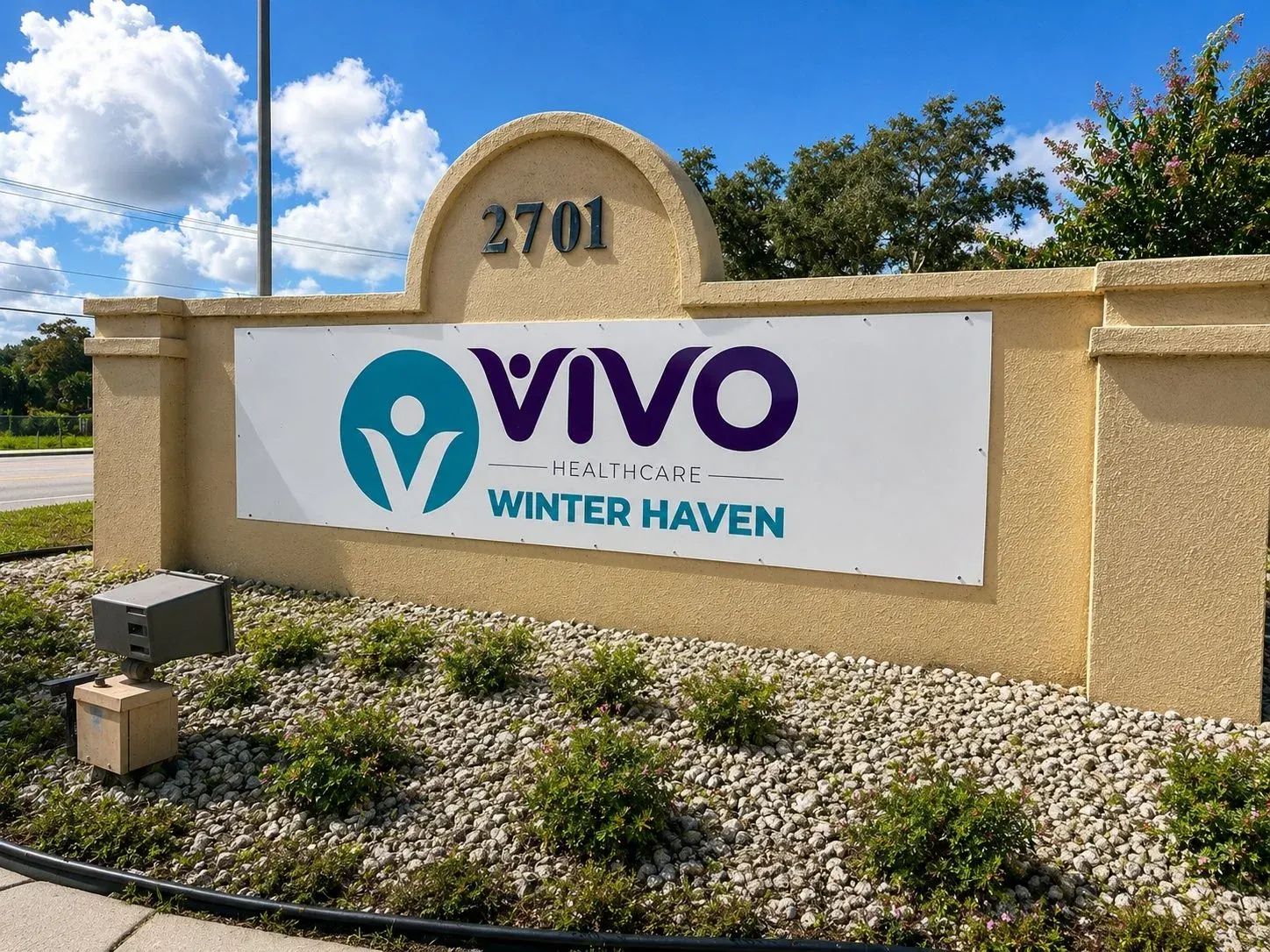 The Vivo Healthcare Winter Haven sign at the street